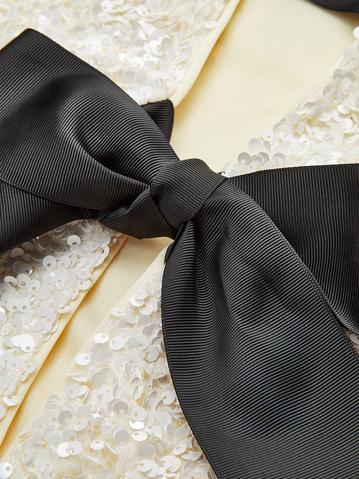 Lavinia | Textured Sequin Jacket with Velvet Bow Detail
